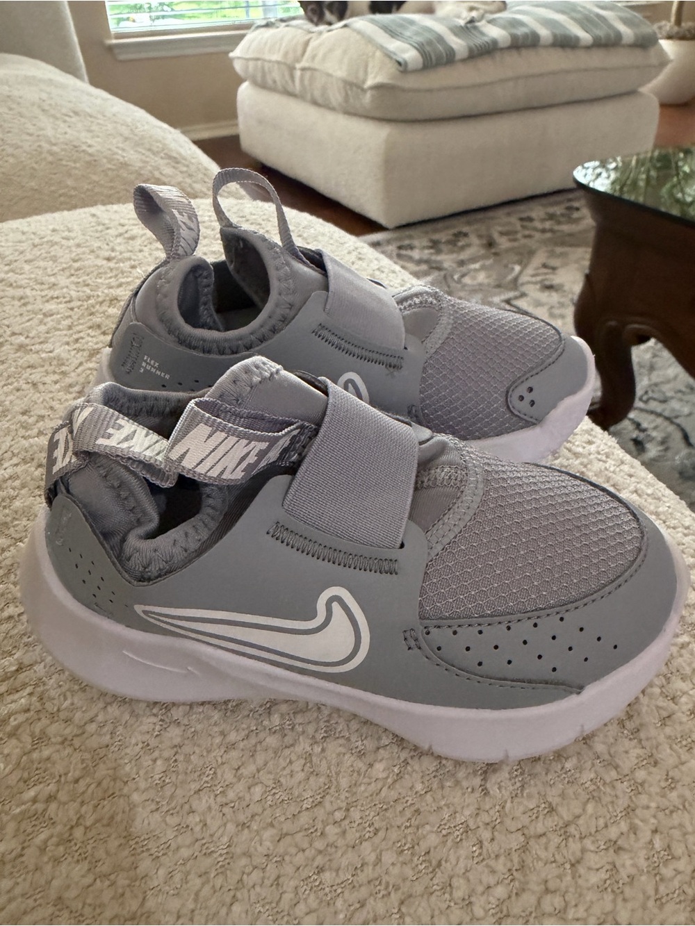 Nike Kids Light Gray Slip-On Sneakers with White Swoosh